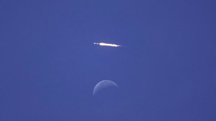 video: spacex falcon 9 over the moon