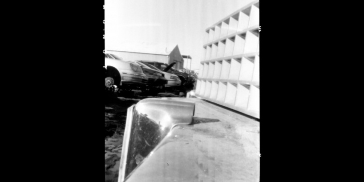 hacked 1948 sears camera looks at junkyard through pinhole lens