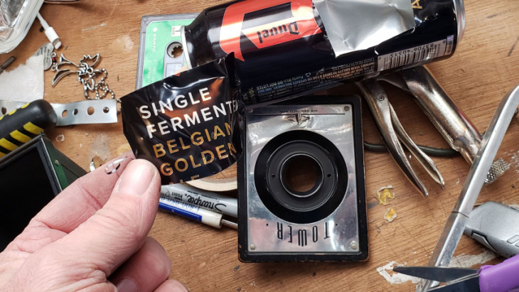 cruelly modified 1940s sears camera sees junkyards through a pinhole