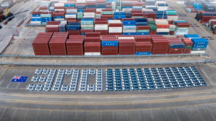byd tweets photo of atto 3s lined up at dock to spell out messages to australia