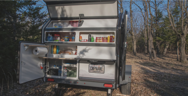 the campinawe off-road camping trailer has everything you need, including a yeti cooler