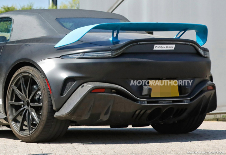 2023 aston martin v12 vantage roadster spy shots: hardcore sports car about to drop its top