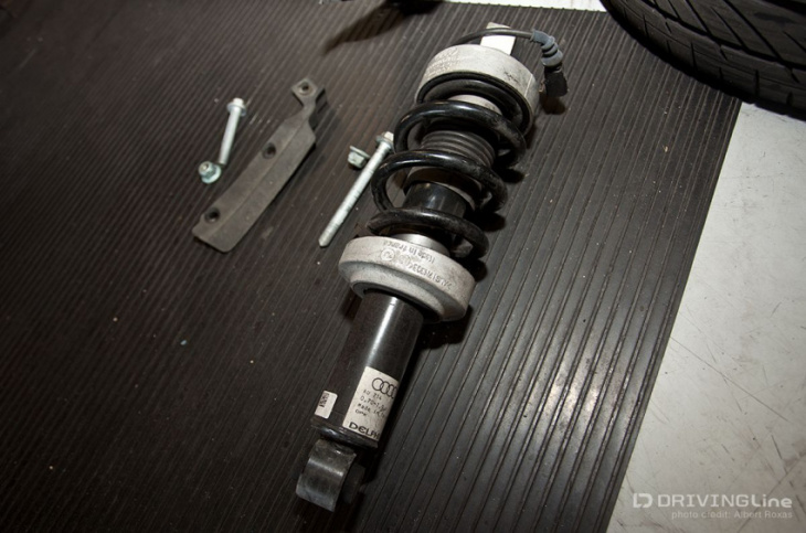 what is magnetic ride control, and how does it differ from traditional suspension?