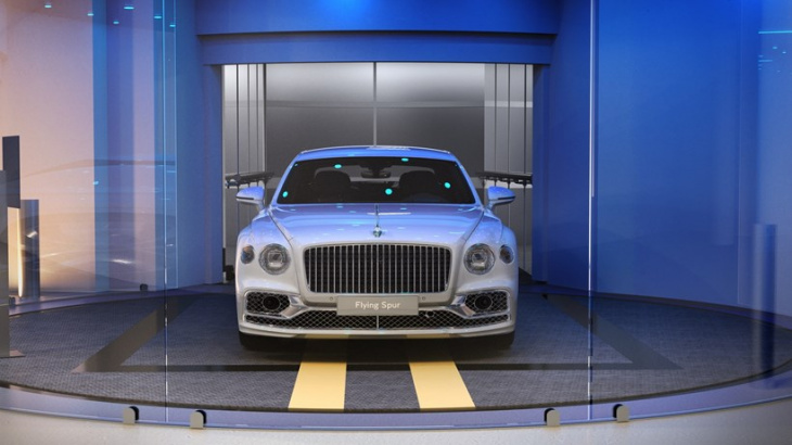 bentley is building an elevator that'll take cars directly to their apartments