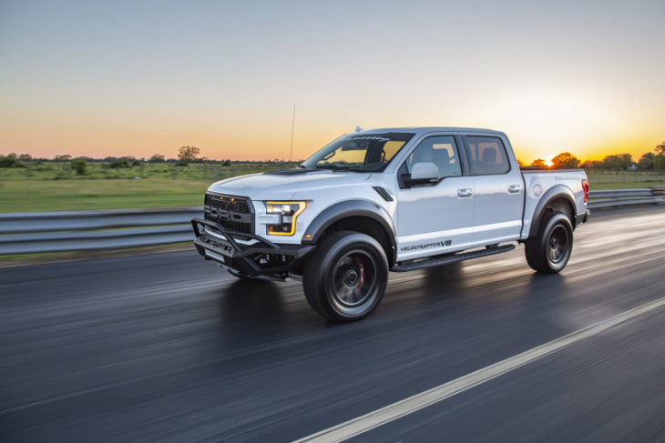 watch this hennessey v8 raptor drag race a stock ford raptor