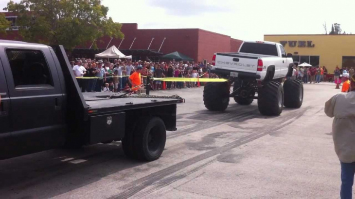 ford 550 pulls chevy monster truck backwards!