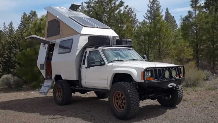 this 1987 jeep comanche gets a cool custom-built pop-up truck camper