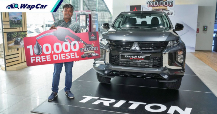 mitsubishi celebrates selling 100,000 tritons in malaysia, gives an owner 100,000km worth of diesel