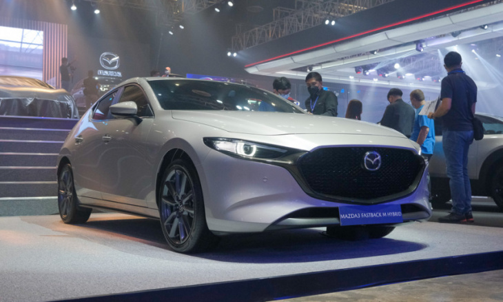 pims 2022: mazda shows off 3 new vehicles at its elegant booth