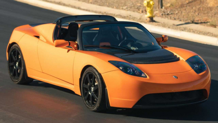 very orange 2010 tesla roadster is up for auction