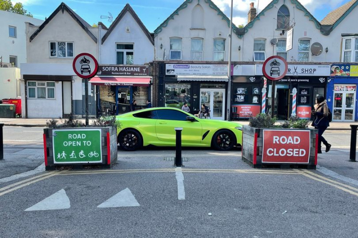 east london residents shame 'selfish' bmw driver for 'worst parking of the year' after car is left sideways across entrance to side road