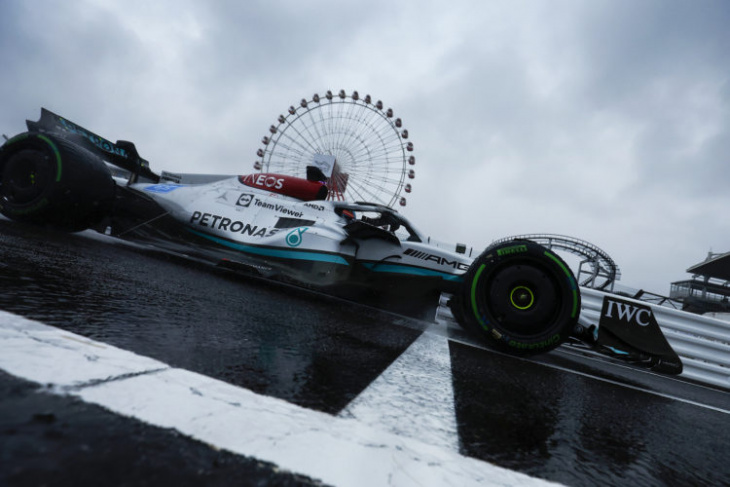 russell leads mercedes 1-2 as rain persists in japan