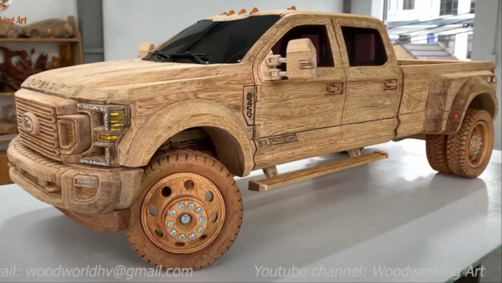 ford f-450 super duty wood carving has folding mirrors, tailgate step
