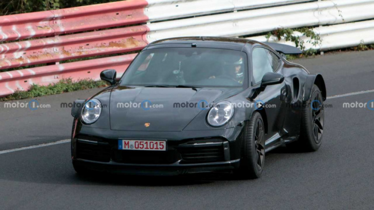 porsche 911 turbo test mule spied riding high and with big fenders