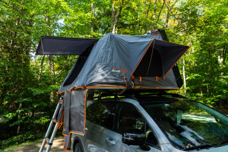 glamping on the roof of a kia sorento is better than it sounds