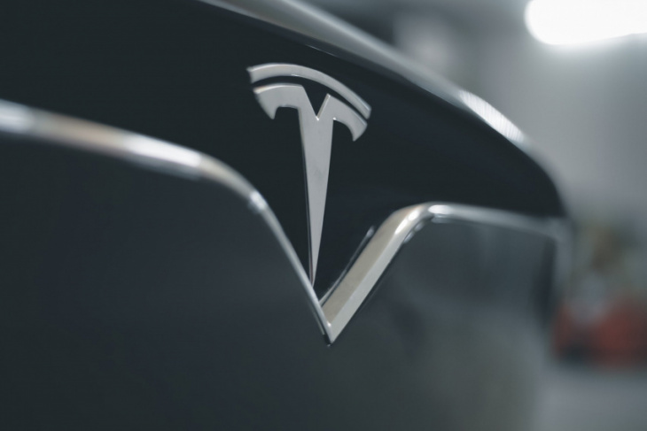 tesla stock upgraded to investment grade by s&p global
