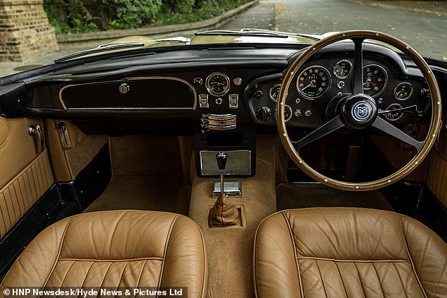 aston martin db5 similar to one in james bond's 'goldfinger' expected to fetch £550,000 at auction