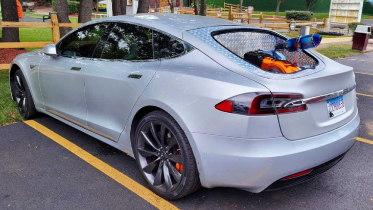 tesla model s becomes a hybrid, never stops to charge on 1,800-mile trip