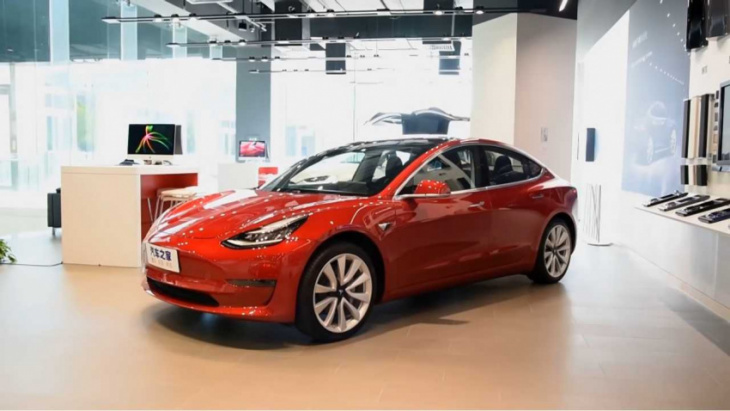 tesla china closes flagship store in beijing