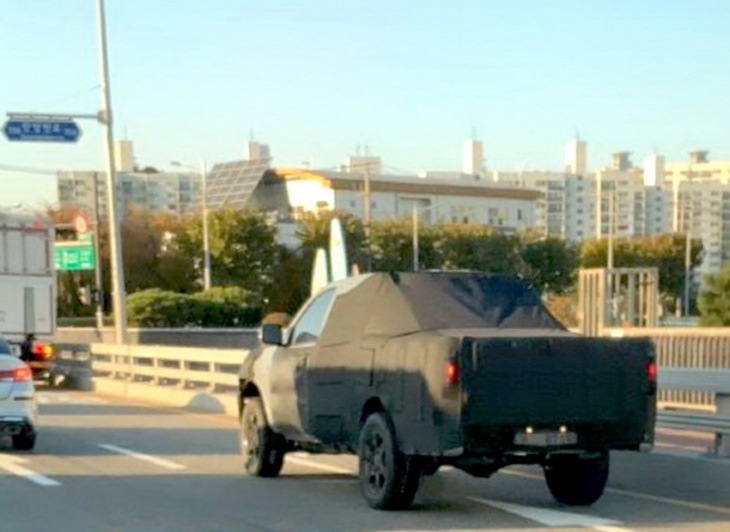 kia pickup truck: shots answer some questions and raise more