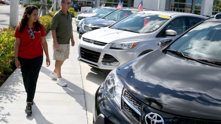 there are finally more cars to buy — but there's a new reason americans can't afford them