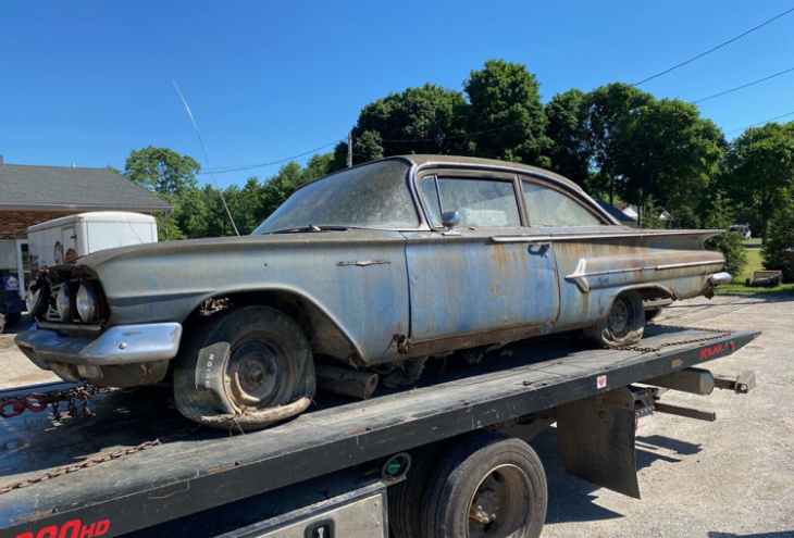 1960 chevrolet bel air sitting in an old barn for who knows how long begs for bringing back to life