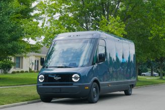 amazon, amazon leans on rivian to deliver packages in 100 u.s. cities for the holidays