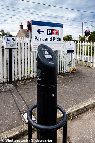 fewer than half of all commuter car parks have electric vehicle charging points, says latest damning review of public infrastructure
