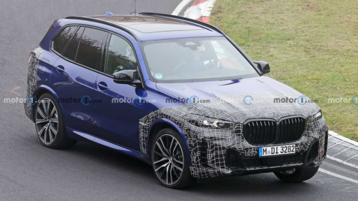 redesigned bmw x5 m60i loses some camouflage in new spy photos