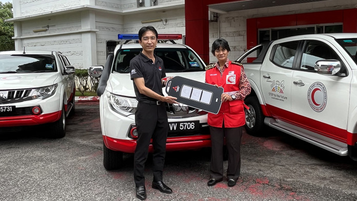 mitsubishi donates 3 tritons to malaysia red crescent society for flood assistance