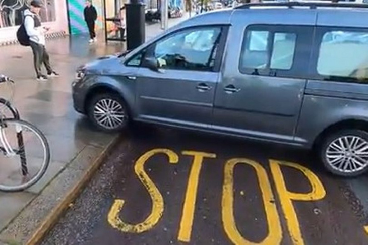 shocking video shows car nearly smash into woman with baby in pram after mounting pavement on illegal u-turn