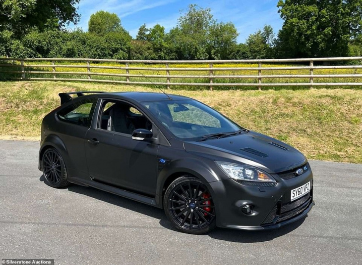 almost £100k for a ford focus! rare rs500 hot hatch with 949 miles on the clock sets new auction world record selling for £99,000 - as four others also go for jaw-dropping sums