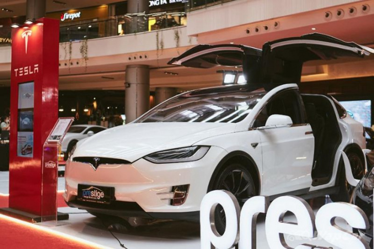 indonesia's investment minister is confident that tesla will be injecting money into the country