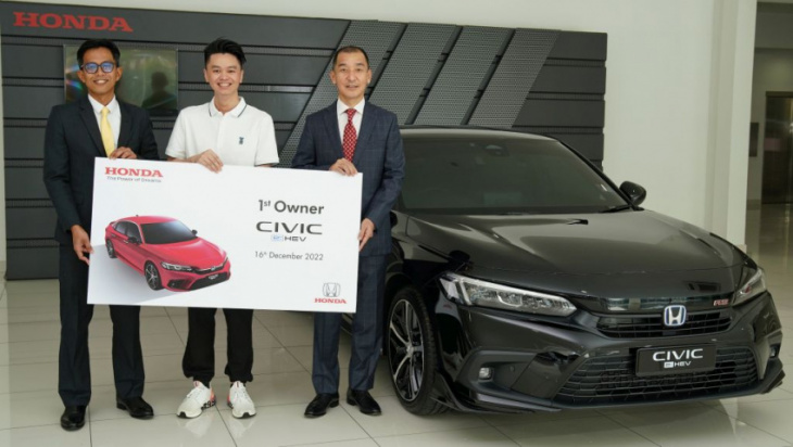 first honda civic e:hev rs owner feted