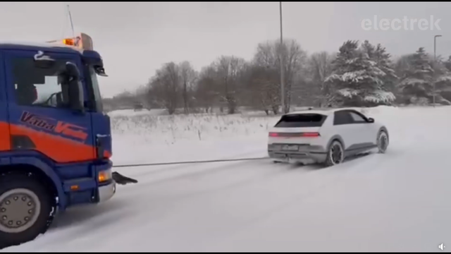 watch a hyundia ioniq 5 tow an entire truck in snowy estonia
