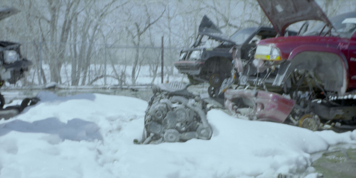 1910 camera shoots modern junkyard engines in wintry color