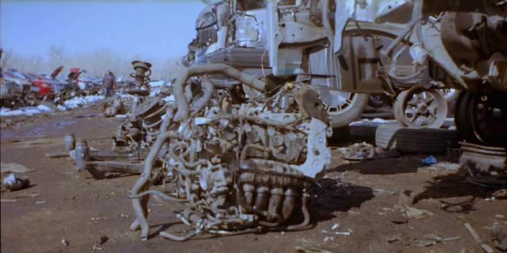 1910 camera shoots modern junkyard engines in wintry color