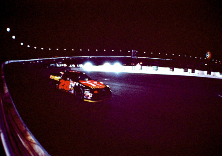 nascar turns on the lights for speedway racing at charlotte in 1992