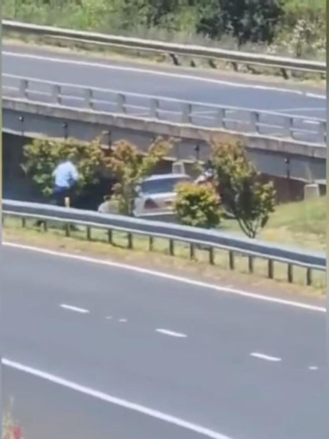 Police officers chased alongside the car before the 33-year-old male drove into a creek in a wild attempt to evade capture. Picture: 9News, National, NSW & ACT, Man drives Mercedes into creek in desperate attempt to evade police