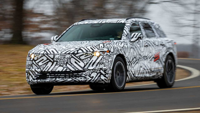 2024 acura zdx teased with camouflaged prototype as testing continues