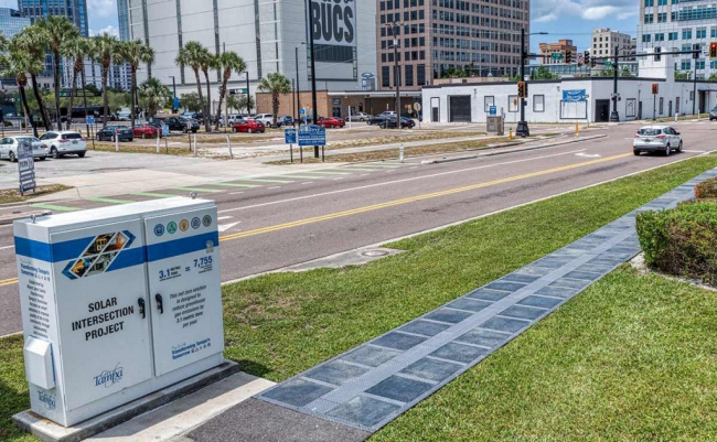 autos news, florida city uses solar sidewalk to power traffic lights