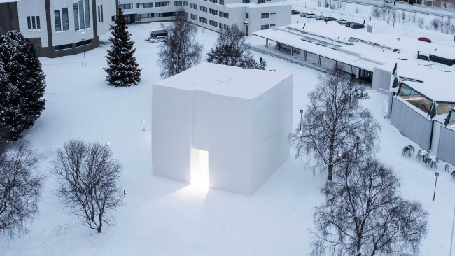 polestar builds finnish three-storey-tall showroom out of snow