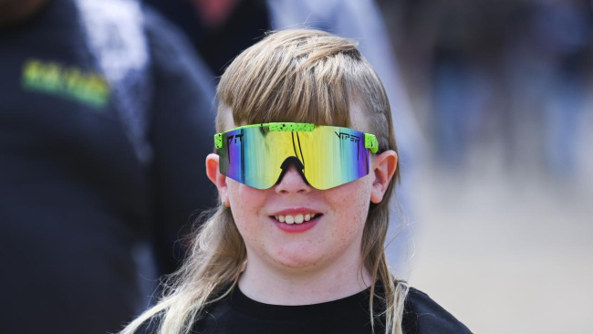 One of the many attendees at the 35th Summernats in Canberra. More than 2700 cars and 100,000 revved up fans descended on Exhibition Park over the four-day event. Pictures: NCA NewsWire / Martin Ollman, National, NSW & ACT, News, Motors, mullets, mayhem fun as hundreds of thousands of fans hit Canberra streets for 35th Summernats