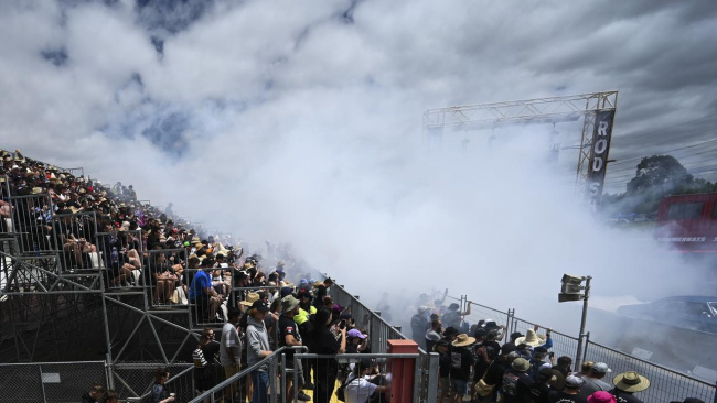 Smoke fills the air during one of the burnout competitions on Saturday., A police sign warning of burnouts at the event., Ticket sales were reportedly so unprecedented they were sold out early on Friday., Classic cars also formed part of the competition., Attendees were treated to shows from artists like Shannon Noll and Daryl Braithwaite on Friday, with Bliss N Eso set to grace the stage on Saturday night., One of the burnout competitions on full display., Fans were treated to days of burnout and drift competitions as thousands of cars were put on show., One of the many attendees at the 35th Summernats in Canberra. More than 2700 cars and 100,000 revved up fans descended on Exhibition Park over the four-day event. Pictures: NCA NewsWire / Martin Ollman, National, NSW & ACT, News, Motors, mullets, mayhem fun as hundreds of thousands of fans hit Canberra streets for 35th Summernats