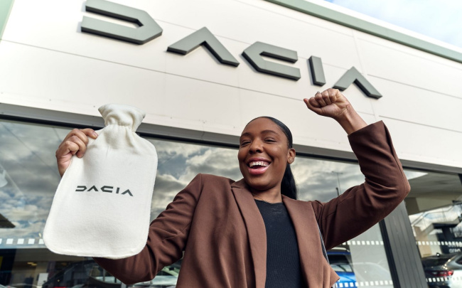 Dacia giving away hot water bottles in a dig at carmakers' heated seat subscriptions