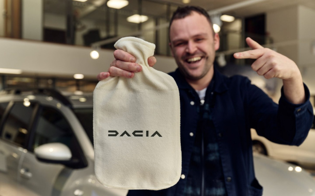 dacia, heated seats, humour, subscription, technology, dacia giving away hot water bottles in a dig at carmakers' heated seat subscriptions