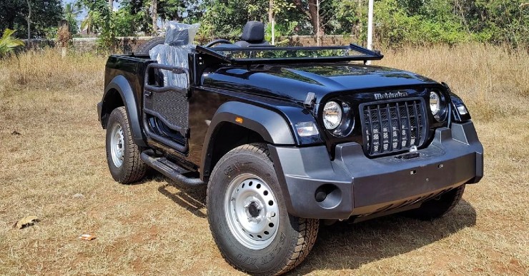 mahindra thar 4x4 suv modified as an open-top willys jeep