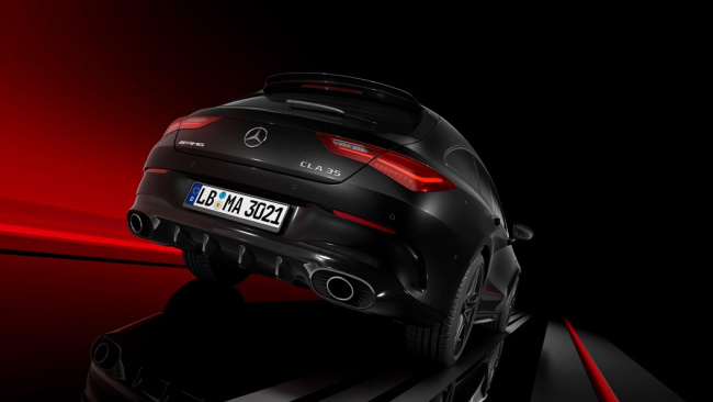 Mercedes-AMG CLA 35 2023 facelift: rear three quarter, black car, studio background