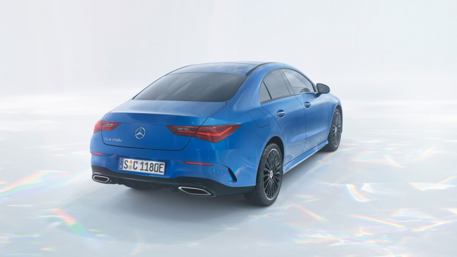 Mercedes CLA 2023 facelift: coupe rear three quarter, blue car, studio background