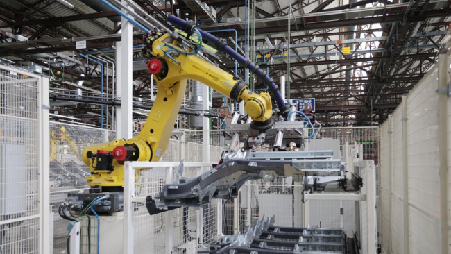 Renault factory: handler robot moving panels